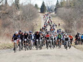 Paris to Ancaster Elite and Olympic Experience VIP race participants led the first wave on Green Lane Road to take on the bicycle ride celebrating its 20th Anniversary Sunday. (Kara Wilson For The Expositor)