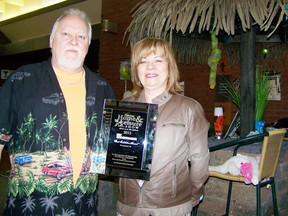 Gilles and Lisanne Seguin show their first place booth award during the chamber of commerce’s Spring Home and Leisure Show at the civic complex on Sunday.
Staff photo/GREG PEERENBOOM