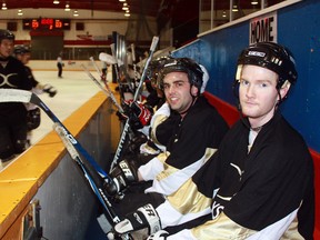 Xstrata Copper forwards Julien Lalande, left, and Ted Hanley take a breather on the bench during the 24 Hour Face Off for Funds in benefit of the Timmins and District Hospital Foundation. TDH Foundation chairwoman Anne Hannah said the more than $66,000 raised by the event will go towards a new telemetry system for the hospital.