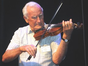 Hillbrand ‘Hip’ Reinders plays the Flopeared Mule (polka) to stomping feet and clapping hands at the 26th Annual Fiddler’s Jamboree. The annual and very popular afternoon event took place in the Douglas J. Cardinal Performing Arts Centre on Sunday and featured more than 20 musicians from across the province. (Elizabeth McSheffrey/Daily Herald-Tribune)