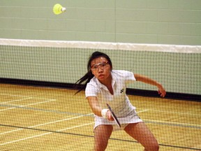Ashlyn Low from Lo-Ellen Park Secondary School returns a shot during the senior girls singles final at the SDSSAA badminton championships at St. Benedict Catholic Secondary School on Saturday. Ben Leeson/The Sudbury Star/QMI Agency