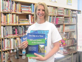 Jennifer Krumins, author of three guides for helping children of all ages with autism, spoke in the library at Ripley-Huron Community School on April 11, 2013 about tips and skills to help teach family members and educators on how to help people with autism. Parents and teachers heard advice from a special education teacher about helping people with autism.