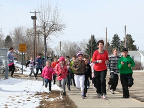 Students and staff from Evergreen Elementary School hit the streets of Drayton Valley as part of the Kids of Steel Club. The club started approximately three weeks ago in order to help encourage and prepare the young athletes for the upcoming Drayton Valley Triathlon.