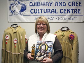A special service will be held at St. Anthony's Cathedral in honour of St. Kateri Tekakwitha, North America's first Aboriginal Catholic Saint. The ceremony will begin at 7 p.m., and will include prayers and readings read in Cree. Kim Piché, pictured, of the Ojibway and Cree Cultural Centre, holds and photograph and a statue of the little-known Saint.