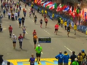 Still image taken from video courtesy of NBC shows an explosion at the Boston Marathon, April 15, 2013. Two explosions struck the marathon as runners crossed the finish line on Monday, witnesses said, injuring an unknown number of people on what is ordinarily a festive day in the city. REUTERS/NBC/Handout