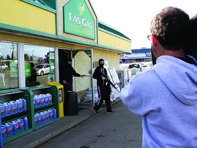 A film crew shoots a robbery re-enactment in Sherwood Park Friday, April 12. Leah Germain/Sherwood Park News/QMI Agency