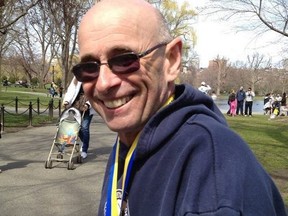 Waterford distance runner Terry Bonnett in downtown Boston soon after finishing the Boston Marathon on Monday. Bonnett and his wife Laura were about a block away when blasts went off near the finish line. The pair were shaken by the incident but not injured. (Laura Bonnett photo)