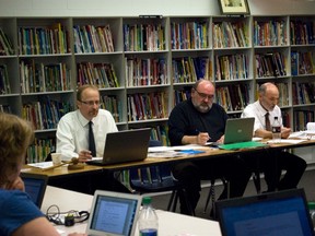 Board chair Preston Meier, superintendent Hazen Barrett, and assistant superintendent Mike Mauws pictured at Thursday's board meeting where it was announced the division would be receiving a $17,000 rebate for copyright fees it payed. (ROBIN DUDGEON/THE GRAPHIC/QMI AGENCY)