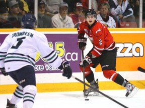 Owen Sound Attack captain Keevin Cutting carries the puck during an Ontario Hockey League  playoff game with the Plymouth Whalers.