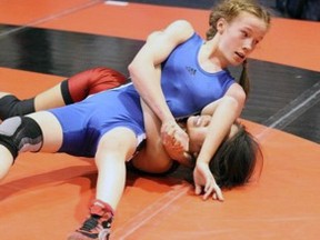 Emily Schaefer takes control of an opponent during the Canadian Juvenile Wrestling Championships in Saskatoon, Sask. last weekend. Schaefer won the women's 48kg division at the event. SUBMITTED PHOTO/THE OBSERVER