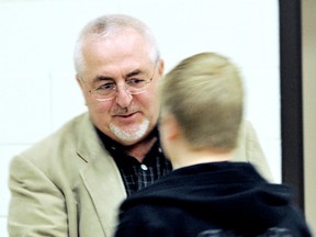 Ottawa city councillor Allan Hubley, speaks with Eben VanKoughnett, 15, a Grade 9 Lambton Kent Composite School student in Dresden, On., about peer based initiatives that could be started within the high school. Hubley spoke about the impact cyber bullying had on his son Jamie, who killed himself in Oct. 2011. DIANA MARTIN/ THE CHATHAM DAILY NEWS/ QMI AGENCY