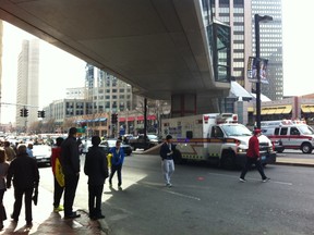 Ambulances line up and wait on Boylston Street in response to two explosions during the Boston Marathon on Monday, April 15, 2013. PHOTO BY KATE BELAIR