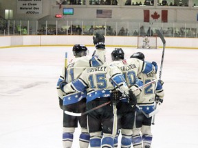 The Bentley Generals celebrate Jeremy Colliton's goal during their first game of the 2013 Allan Cup against the Rosetown Redwings. The Generals would go on to 2-0. April 15, 2013. 
BRICE ROY/Lacombe Globe/QMI Agency