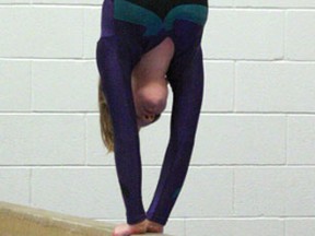 Morgan Anderson performs a back walk-over on the balance beam at practice on Monday, April 15. The Aerialettes just returned from a competition in Sioux Lookout and have their year-end show this Friday, April 19.
GRACE PROTOPAPAS/Daily Miner and News