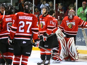 Owen Sound Attack goalie Jordan Binnington, right, and his teammates react after loosing 3-1 in game six to the Plymouth Whalers on Sunday, April 14, 2013 at  the Lumley Bayshore in Owen Sound. The  Whalers eliminated the Attack in game six of their second round OHL playoff series 4 games to 2. (JAMES MASTERS/QMI Agency/The Sun Times)