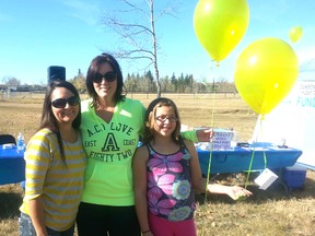 Karen Gilkyson, Amanda Green and Jordan Green at the Walk to Remember in Dawson Creek, where the two women got the idea to start a walk and support group in Grande Prairie. (Supplied)