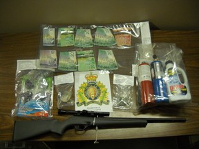 Vegreville RCMP on Sunday seized drug use paraphernalia and 11 grams of crystal meth. Officers also seized over $800 in cash, as well as electronics and tools which are believed to be stolen. Photo supplied