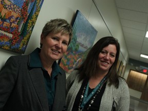 Mary-Anne Murphy (left) and Kathy DeWeerd (right) are working to fill more of Woodstock Hospital's blank walls with local art. (CODI WILSON, Sentinel-Review)