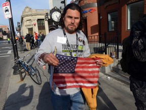Carlos Arredondo, who was at the finish line of the 117th Boston Marathon when two explosives detonated, leaves the scene on April 15, 2013 in Boston, Massachusetts. Darren McCollester/Getty Images/AFP