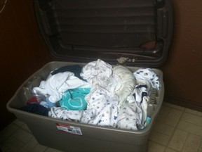A tub of baby clothing was found on Highway 533 on April 17.