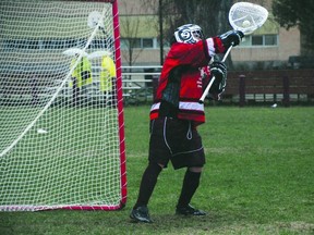 Portage Collegiate Institute Trojans goalie Keaton Bachalo makes a save last season. (File photo)