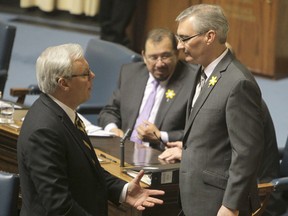 Premier Greg Selinger (left) talks to Stan Struthers before he delivers the budget at the Legislative Building in Winnipeg. Tuesday, April 16, 2013. (Chris Procaylo/Winnipeg Sun)