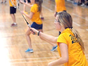 SCOTT WISHART The Beacon Herald
Stratford St. Michael's Siobhan McCarroll eyes a return while playing mixed doubles with partner Tyler Kocher at the Huron-Perth badminton championships at Burnside Agriplex Tuesday.