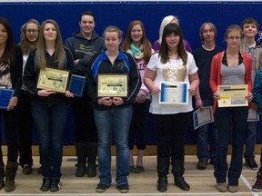 Fairview High School students line up for a photo after receiving their VIC, Cobra, and Citizenship awards. 
Front row from left to right: Haylee Bask, Sophia Strydhorst, Kaylee Shymruk, Jordy Obrigewitch, Jorden De Jong, Devon Reardon.
Back row from left to right: Rachelle Jorgensen, Rebecca Paul, Miranda Giesbrecht, Marcy Osowetski, Zane Moffatt-Toews, Matthew Winter, Nathanael Kneeland, Scott Perkins.