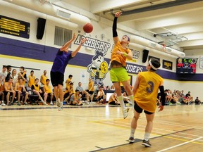 Over 70 students laced up their sneakers to participate in the 4th annual Archbishop MacDonald 12-hour marathon basketball fundraiser at Archbishop MacDonald high school last week. The school raised over $5,000 to help build a school in Sierra Leone. TREVOR ROBB Edmonton Examiner