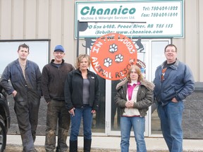 Channico Machine & Millwright Services Ltd. created and donated a sign for In The Woods Animal Rescue, located west of Marie Reine. Pictured in photo Nathan Bagley (machinist with Channico), Derek Darago (welder who made the sign), Lee Wilson Channico safety and office manager and In The Woods partner, Sheryl Woods (In The Woods president) and Frank Light, Channico owner.