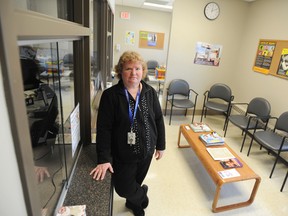 Rhonda Galler, a supervisor of environmental health and prevention services, stands in the shared waiting room for sexual health, immunizations and other clinical services at the Lambton County Community Health Services Department Wednesday near Sarnia. Signs that identified patients for either immunizations or sexual health came down this week after the department heard about a client complaint about privacy. TYLER KULA/ THE OBSERVER/ QMI AGENCY