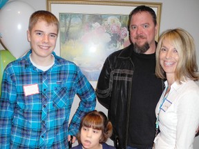 SARAH DOKTOR Simcoe Reformer
The Wilson family from Port Dover was among 33 local caregivers recognized as being Heroes in the Home by the Hamilton Niagara Haldimand Brant Community Care Access Centre during a ceremony at the Greens at Renton on Tuesday. From left to right are Jacob Wilson, 15, Grace Wilson, 13, Mark Wilson and Charlene Wilson.