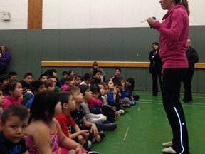 Two-time Olympic medalist Beckie Scott speaks to students in Fort McKay last Thursday. Scott was in town to give a presentation and take youth cross country skiing as part of the Ski Fit North Alberta program.  TREVOR HOWLETT/TODAY STAFF