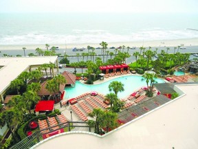 San Luis Resort, Spa and Conference Centre offers the best of both worlds: ready access to Galveston Island?s Gulf beachfront and a lush heated outdoor pool with swim-up bar. The 30-acre complex also boasts luxury accommodation, fine dining and complete spa facilities. (JOHN LUND, The London Free Press)