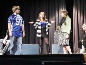 St. Lawrence Secondary School students Christian Charbonneau, Michaela Wheeler and Megan Livingston, practise their play before performing for the 67th annual Eastern Regional Sears Drama Festival this week at Holy Trinity Catholic Secondary School. 
Staff photo/ERIKA GLASBERG