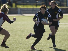 Napanee’s Brittany Benn, carrying the ball for the Guelph Gryphons women’s rugby team, is among four female finalists for a prestigious national university athletics award. (Guelph Athletics)