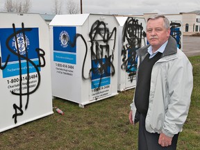 BRIAN THOMPSON, The Expositor

Glenn Manderson, director of Kidney Clothes for the Kidney Foundation of Canada, stands next to four clothing donation bins outside the charity's office on Park Road North.