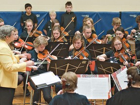 BRIAN THOMPSON, The Expositor

Virginia Little conducts the Little String Orchestra on Wednesday during a performance at Onondaga-Brant School on Brant School Road. Little will hang up her baton after the orchestra’s 36th annual Spring Concert on April 25.