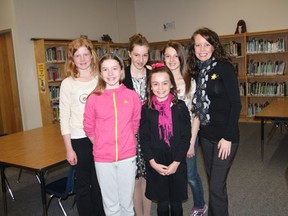 (L to R.) Grade 6 students at Brunswick School Madison Klenk, Olivia White, Alexandria Martin, Laura Dean and Jenna Fedusiak met with Megan Sweeny of the Canadian cancer Sociaty to donate the proceeds of their recent bake sale.