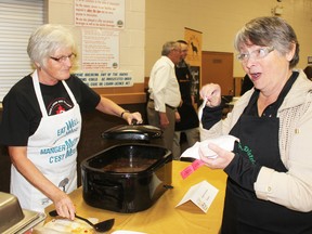 Lin Steffler, of Seaforth, enjoys a sample of soup served up by Sheila Lavoie at the Souper Saturday event to raise money for the Seaforth and District Food Bank.