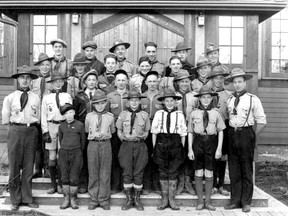 St. George is the patron saint of the Scouting movement. In 1940, Grande Prairie leaders Rev. T. Dale Jones and Garnet Freebury posed with their troop on the steps of the Anglican church, then at the corner of 102 Street and 99 Avenue. The building was relocated a couple of blocks south in 2008 and is in the restoration process. The troop: (front row, from left) Bob Knight, Deane Toews, Don Swanston, Sam Lowe, Ivan Ford, Garnet Freebury; (second row, from left) Rev. Dale Jones, Ray Mitchell, Pat Davies, Bill Bessent, Bob Bessent, Gordon Pearcy, Wendel Oliver; (third row from left) Jim Carlisle, John Bishop, Ken Leslie, Bill Minchin, Jack Swanston, Roy Harper; (back row from left) George Bentley, Marvin Aiken, Dave Spittal, Lynn Wilson, Jack McFetridge, Herb Shields. (SOUTH PEACE REGIONAL ARCHIVES)