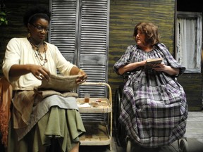 Annabelle (Lisa Barnes-Hecker) and Sisser Bean (Scarlett Marenger) speak on the porch of the Bean home in a scene from Sault Theatre Workshop’s production of The Sugar Witch.