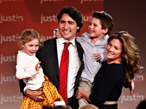 Justin Trudeau, his wife Sophie Gregoire, son Xavier and daughter Ella-Grace react after he was named the new leader of the Liberal Party of Canada in Ottawa April 14, 2013.