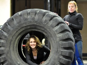 The Alzheimer’s Society is taking a tough stance on fundraising as they are preparing to host the first ever Mud Factor on July 20. The fundraiser aims to encourage healthy living and camaraderie, all in the name of fighting Alzheimer’s disease. Organizer Taylor Columbus, left, displayed one of the obstacles participants can expect along with Discover Fitness personal trainer Teresa Ward.