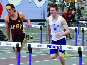 TISS athlete Ryan Harper, right, approaches a hurdle during the senior boys 110-metre sprint hurdles at Friday's Pirates Relay. Harper won the event with a time of 15.46 (STEVE PETTIBONE/The Recorder and Times).