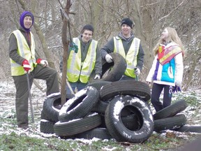 Local volunteers concerned about their environment helped with Thames River Cleanup in Woodstock Saturday morning. From left Darwin Cooper, Nate Lindlau, David Brown and Vanessa Ralph. HEATHER RIVERS/WOODSTOCK SENTINEL-REVIEW