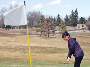 Christine Nowak of High River came out to the Vulcan Golf and Country Club's opening day on Friday with her husband Stan. The couple had already golfed twice in Claresholm and once in Creston, B.C., and were glad to be able to make it to Vulcan's opening day.
