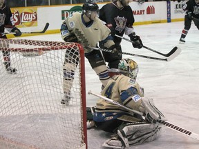 2013 Allan Cup tournament MVP Dan Bakala enters the butterfly to make a save in the final against the Clarenville Caribous. April 20, 2013.
BRICE ROY/Lacombe Globe/QMI Agency