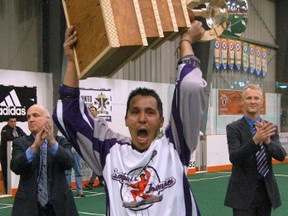 DARRYL G. SMART, The Expositor

Captain Kyle Jamieson holds up the Creator's Cup after he and his teammates capture the Canadian Lacrosse League title with a 14-11 win over the Toronto Shooting Stars on Sunday at the Iroquois Lacrosse Arena.