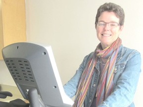 Nancy Payne, exercise therapist at the Kincardine's Hearts in Motion program, tries out an exercise bike in the program's gym. Those who have suffered a cardiac event can be referred to the program by their doctor and participate in educational lectures and supervised exercise. (ALANNA RICE/KINCARDINE NEWS)